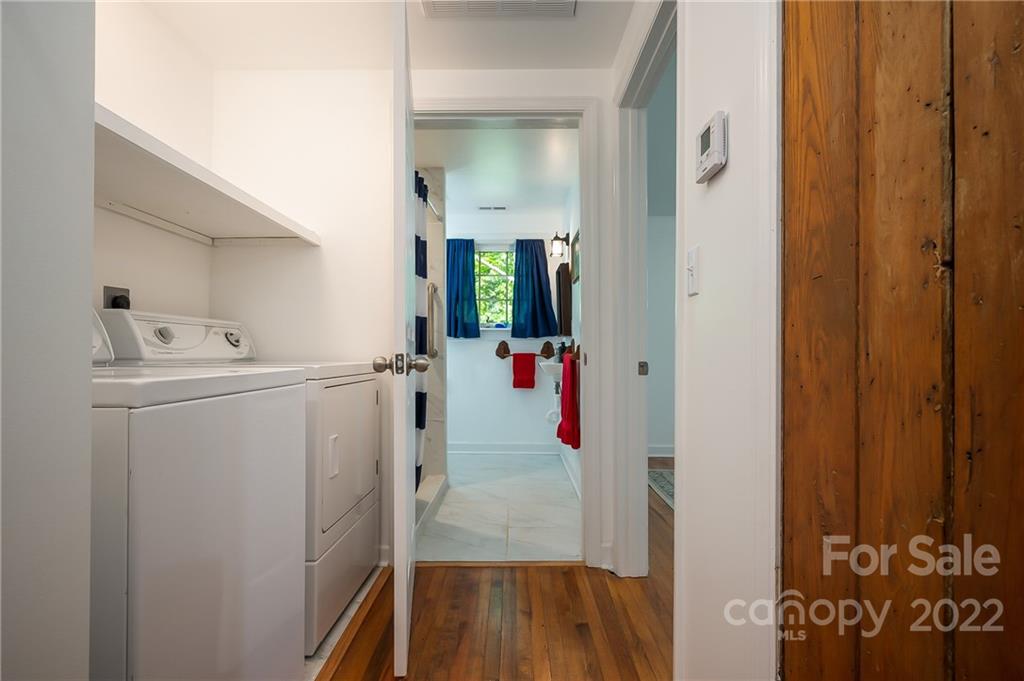 146 Hidden Hill Road Tryon, NC 28782 - Photo 24 of 43 a utility room with closet dryer and washer