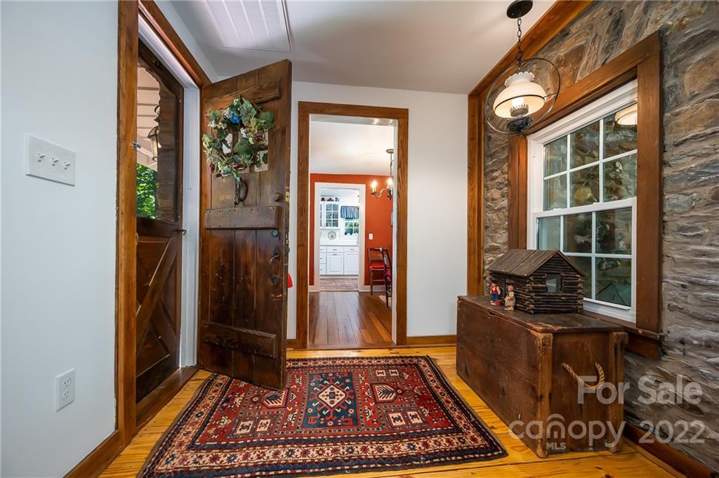 146 Hidden Hill Road Tryon, NC 28782 - Photo 3 of 43 a view of an entryway with a rug