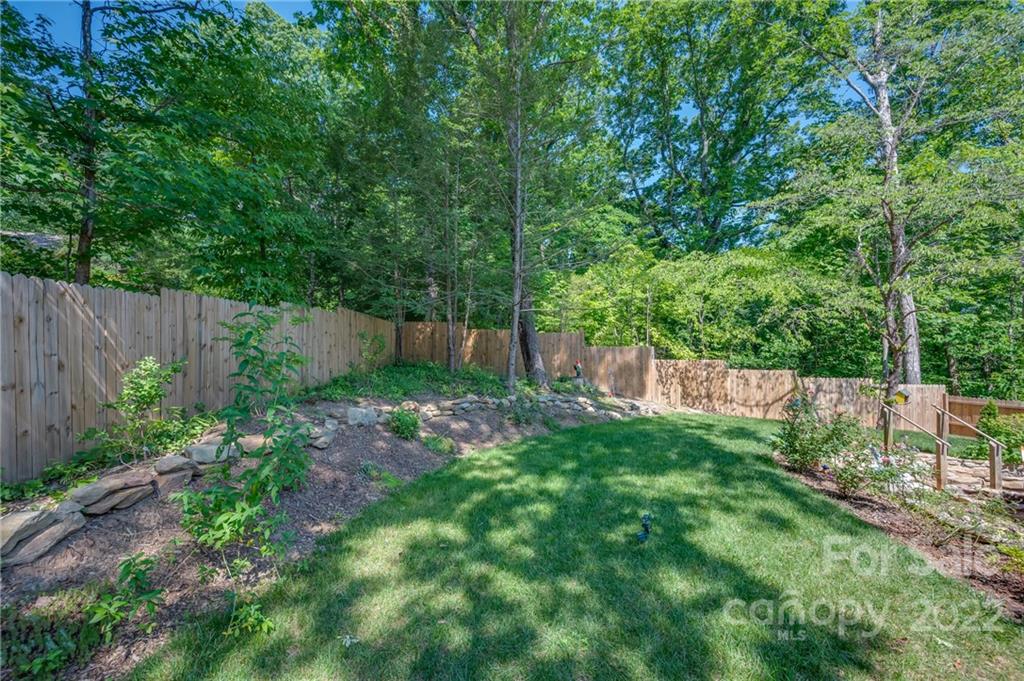 146 Hidden Hill Road Tryon, NC 28782 - Photo 31 of 43 a view of a backyard