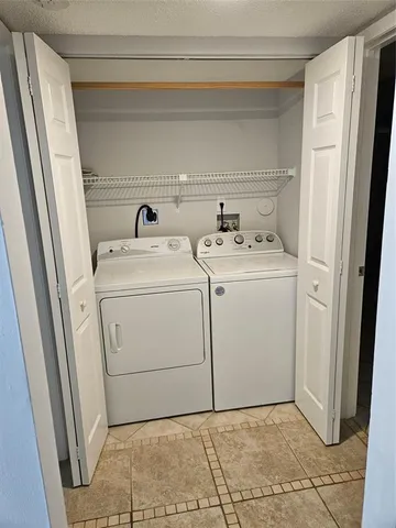 a view of swimming pool with a yard