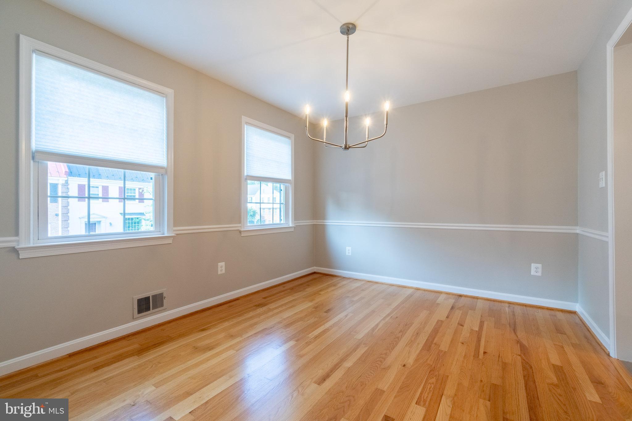 6754 Towne Lane Road McLean, VA 22101 - Photo 19 of 33 a view of empty room with wooden floor and fan