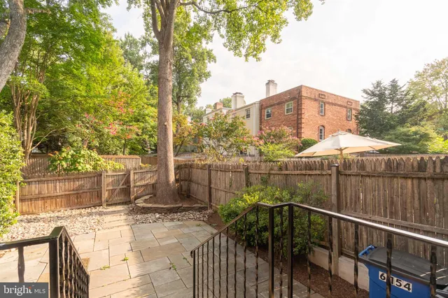 a view of a terrace with sitting area