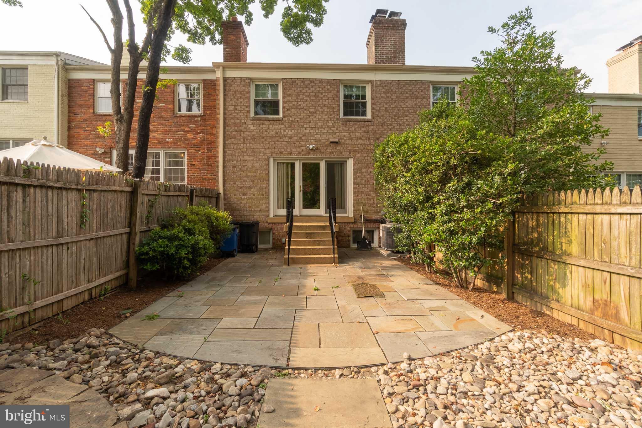 6754 Towne Lane Road McLean, VA 22101 - Photo 33 of 33 a view of a backyard with plants and large trees