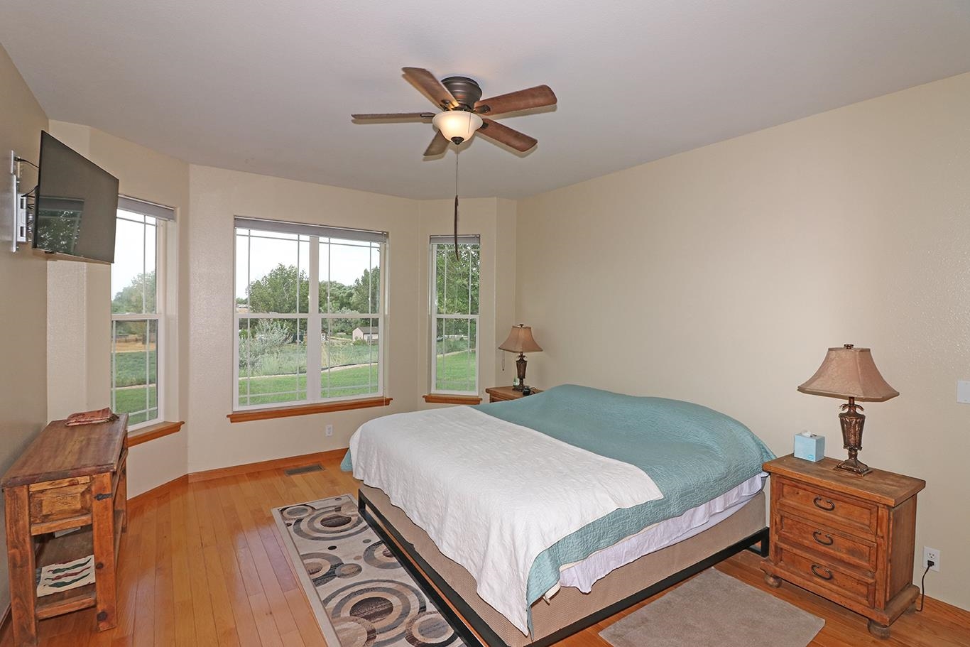 1198 23 Road Grand Junction, CO 81505 - Photo 12 of 32 a bedroom with a bed and window