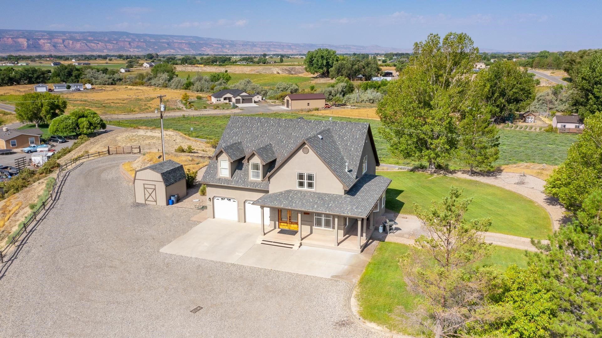 1198 23 Road Grand Junction, CO 81505 - Photo 2 of 32 an aerial view of a house with a garden