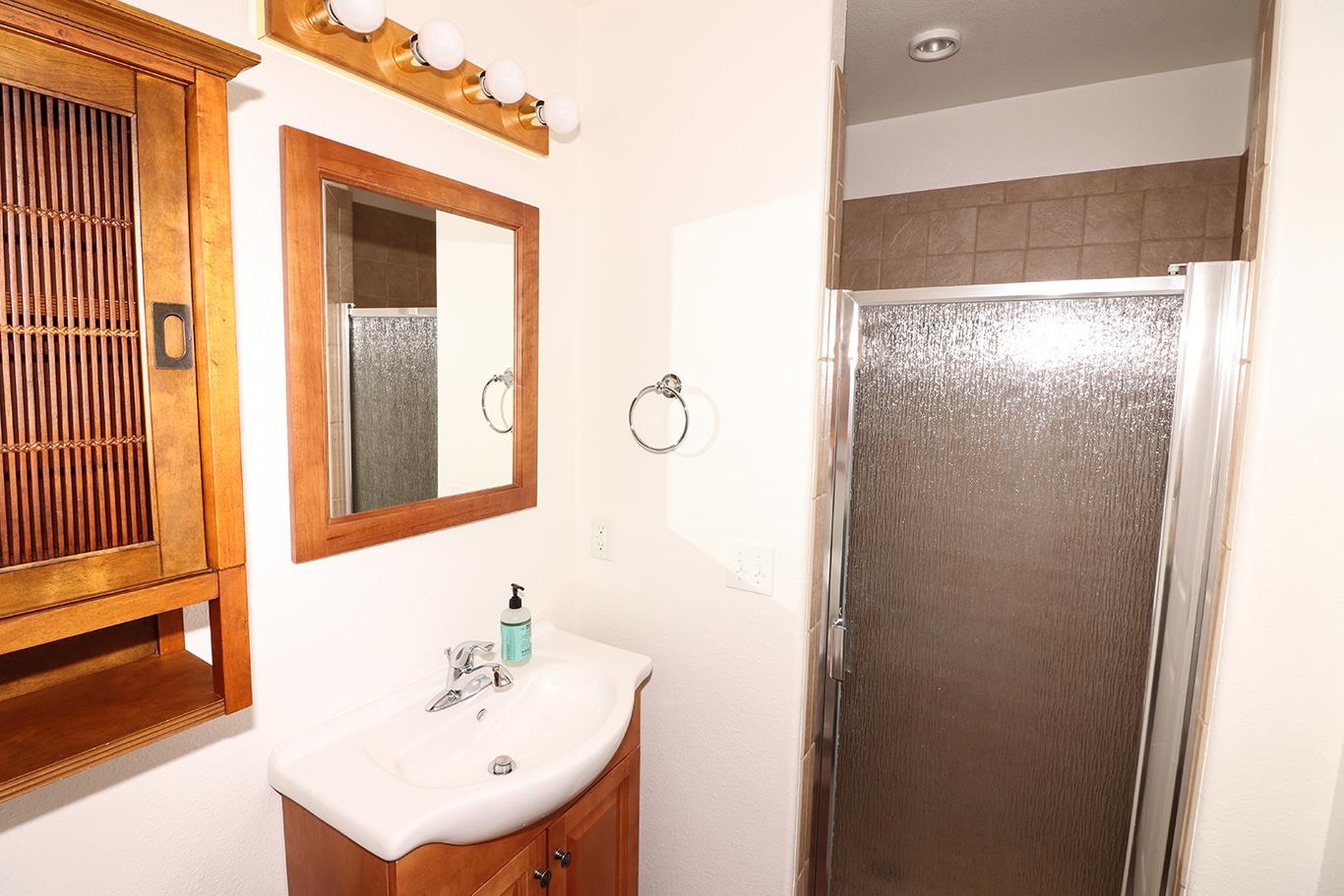 1198 23 Road Grand Junction, CO 81505 - Photo 24 of 32 a bathroom with a sink and a mirror
