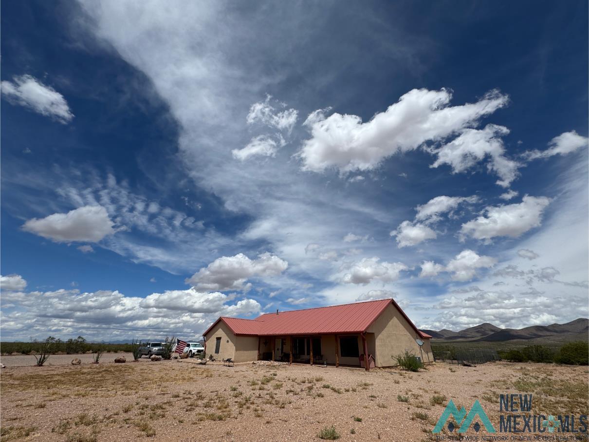 33 R Bar Road Rodeo, NM 88056 - Photo 1 of 20 View of home looking NE.