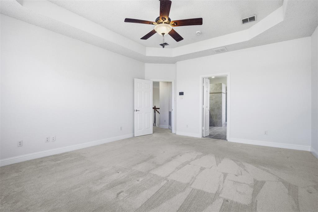 4425 Foxtail Lane Plano, TX 75024 - Photo 19 of 33 a view of empty room with ceiling fan