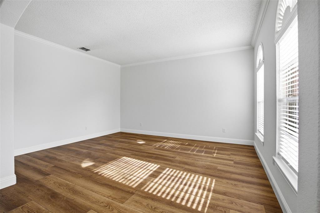 4425 Foxtail Lane Plano, TX 75024 - Photo 6 of 33 a view of a room with wooden floor and window