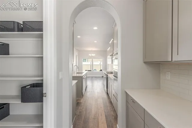 a view of a kitchen and dining room