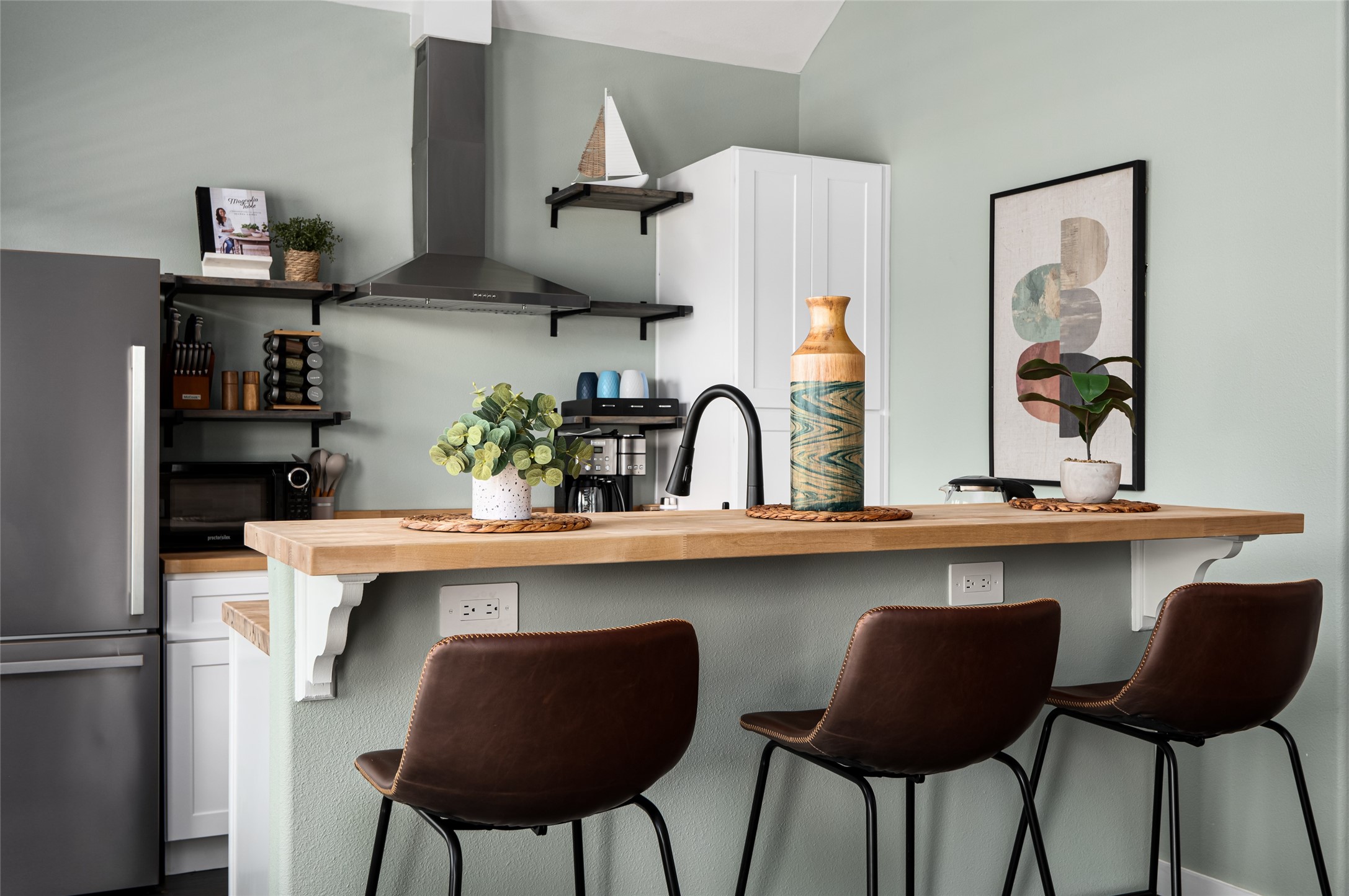 1084 Johnson Road Port Bolivar, TX 77650 - Photo 11 of 39 a kitchen with stainless steel appliances a sink and cabinets
