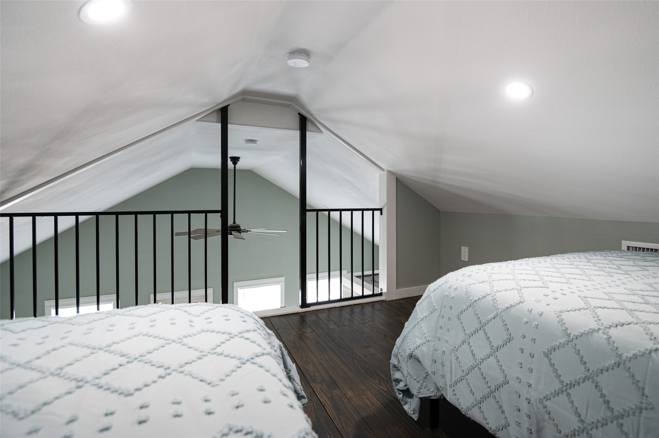 1084 Johnson Road Port Bolivar, TX 77650 - Photo 26 of 39 a bed sitting in a bedroom next to a window