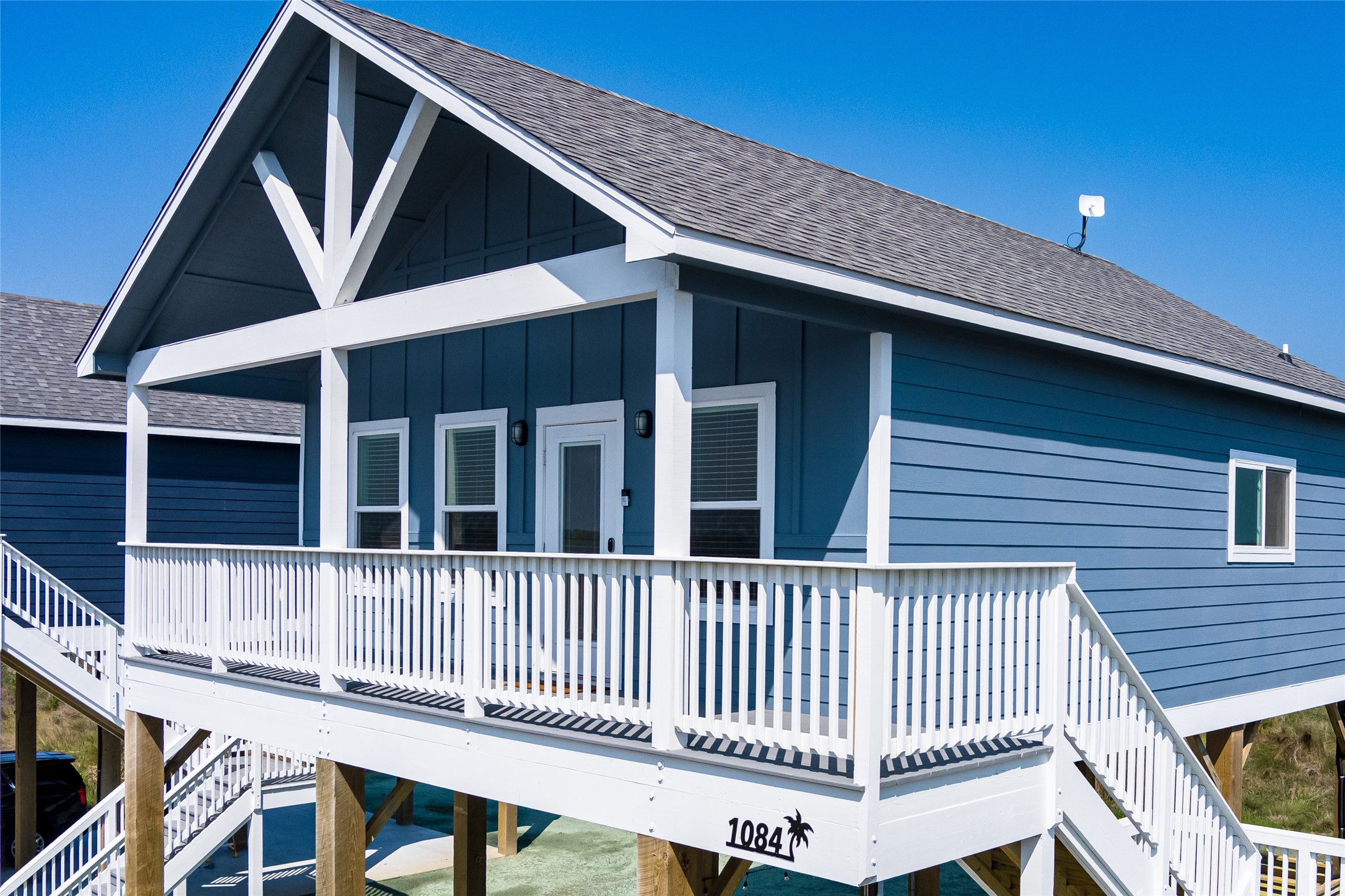 1084 Johnson Road Port Bolivar, TX 77650 - Photo 27 of 39 a view of a house with wooden deck