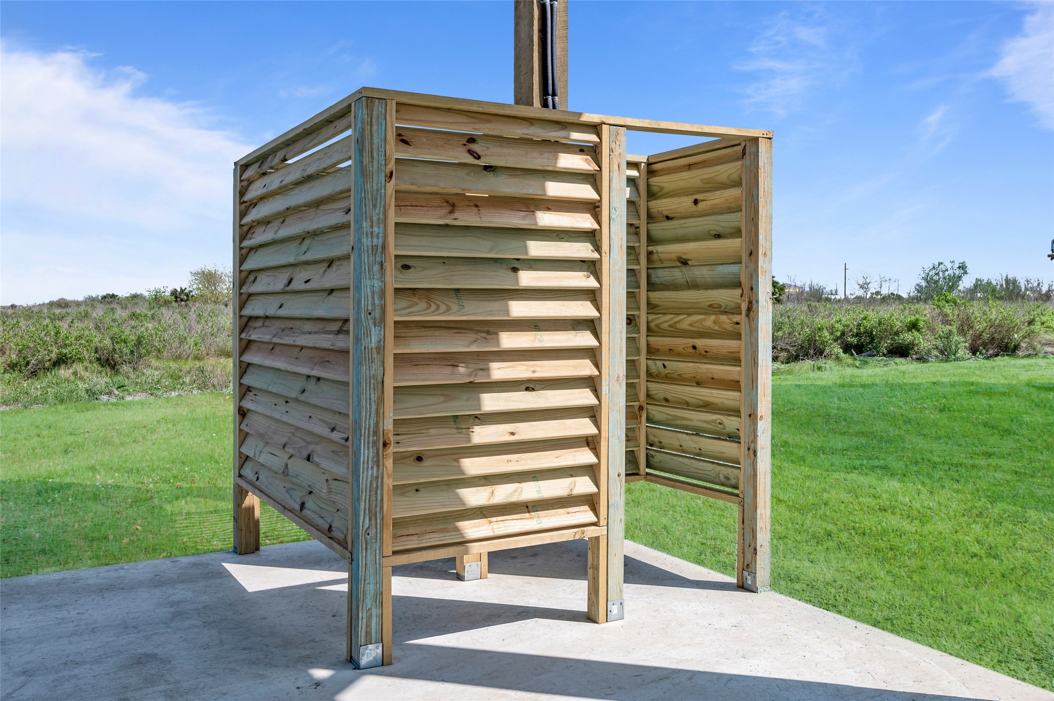 1084 Johnson Road Port Bolivar, TX 77650 - Photo 29 of 39 a front view of a building with a yard
