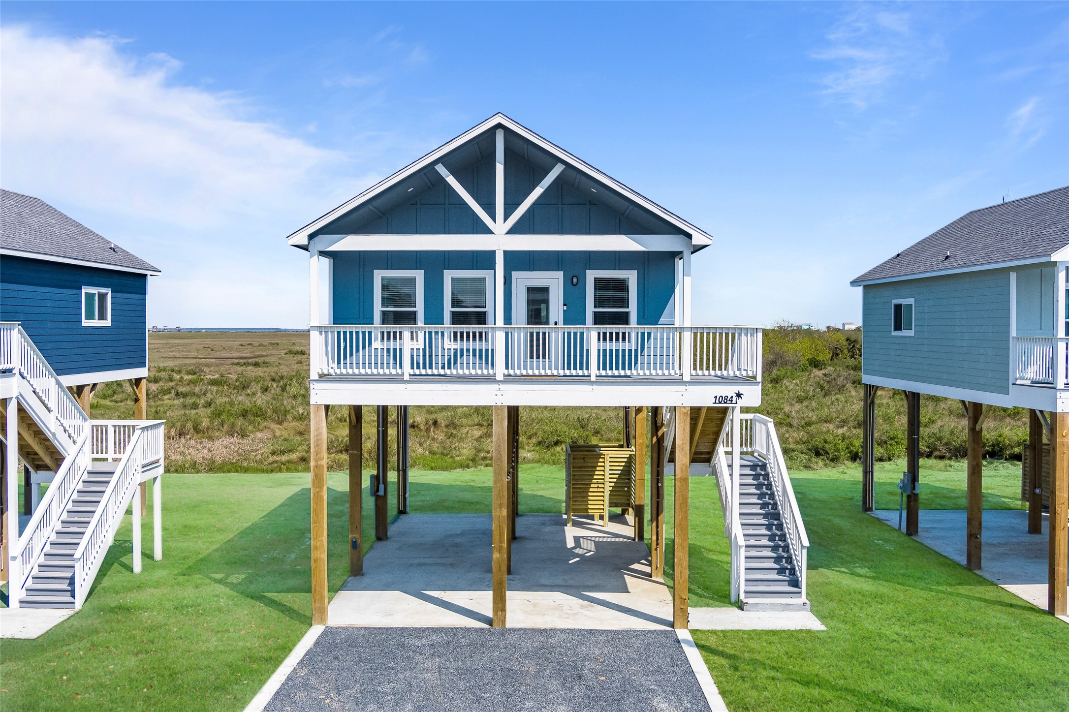 1084 Johnson Road Port Bolivar, TX 77650 - Photo 4 of 39 a front view of a house with a yard