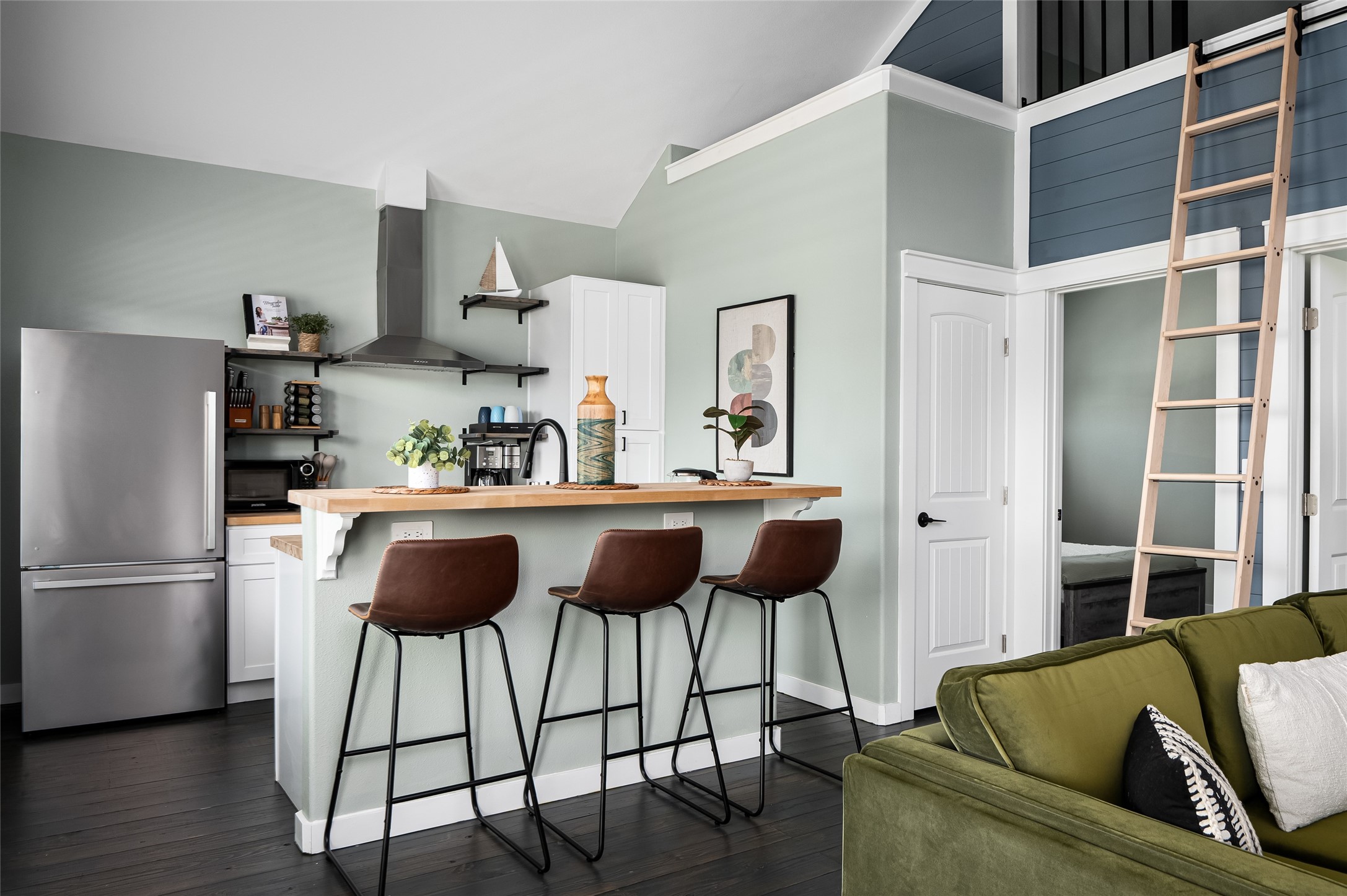 1084 Johnson Road Port Bolivar, TX 77650 - Photo 10 of 39 a kitchen with stainless steel appliances granite countertop a refrigerator and a view of living room
