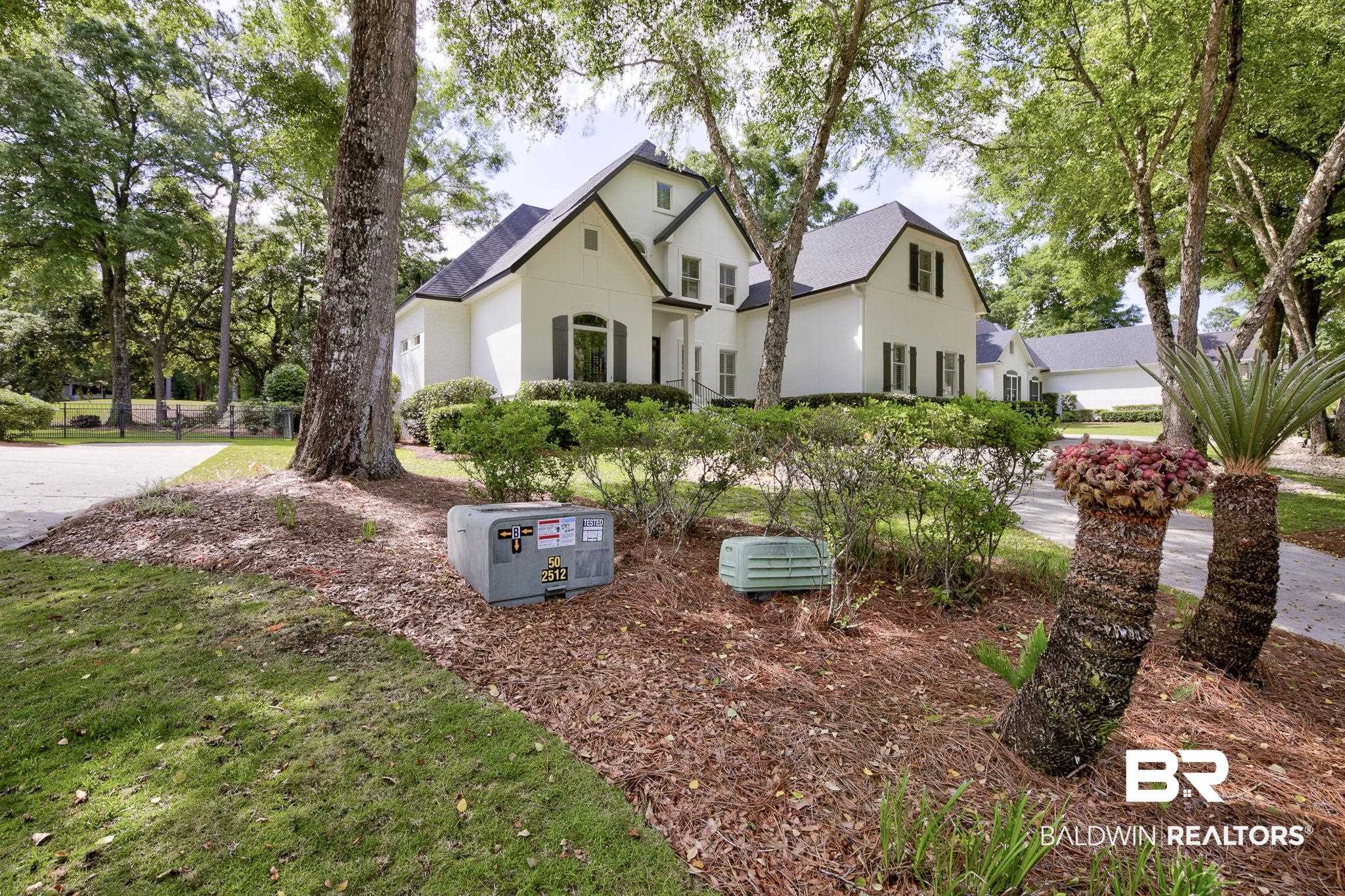 105 High Pines Ridge Fairhope, AL 36532 - Photo 83 of 97 View of front facade featuring a shingled roof and stucco siding