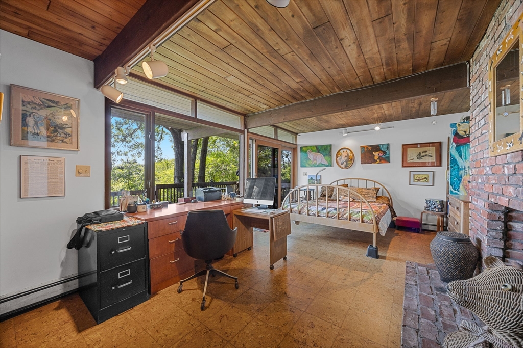25 Resolution Road Truro, MA 02666 - Photo 17 of 42 a view of a livingroom with workspace and a window
