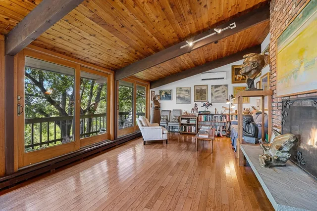 a outdoor space with lots of furniture and wooden floor