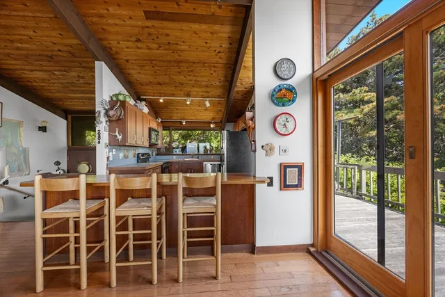 a area with a table and chairs