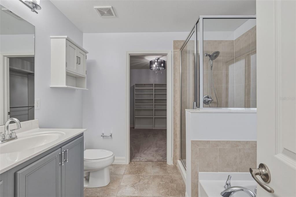 25134 Palisade Road Punta Gorda, FL 33983 - Photo 47 of 58 a bathroom with a granite countertop sink toilet and shower