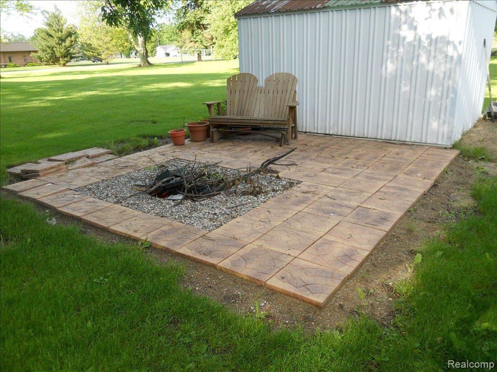 29 East Miller Road Sandusky, MI 48471 - Photo 16 of 16 Paver stone Patio with Fire Pit