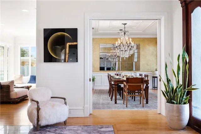 a kitchen with a sink appliances and cabinets