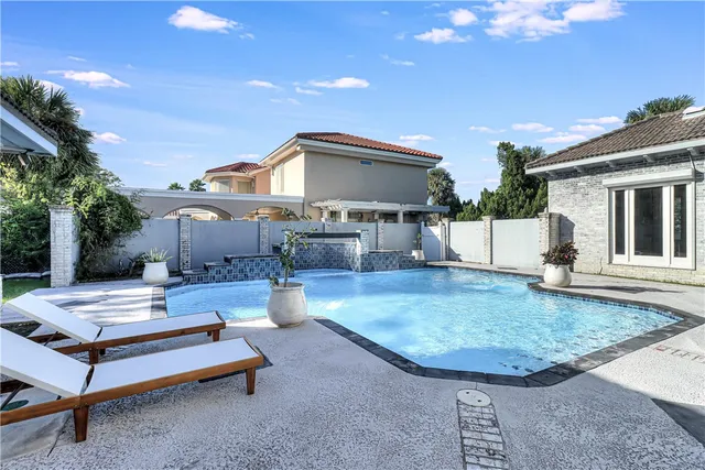 a view of a patio with a table and a chairs