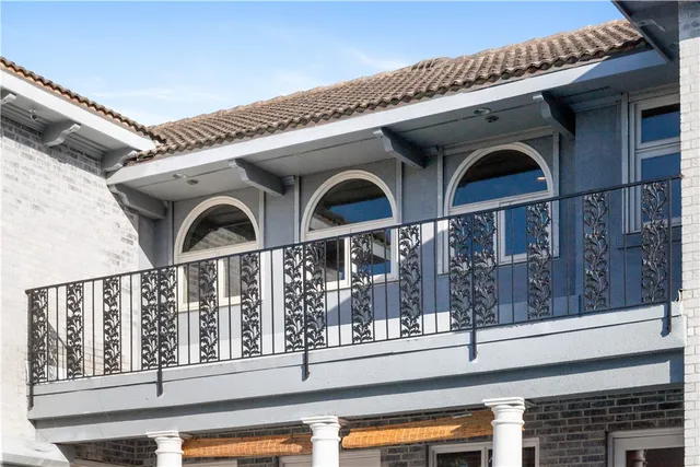 a view of a swimming pool with an outdoor space and seating area