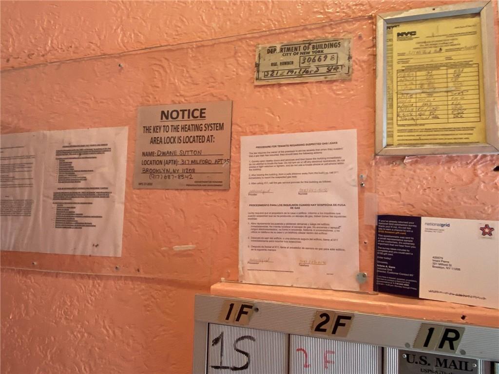 321 Milford Street Brooklyn, NY 11208 - Photo 18 of 31 a view of a door and an empty room