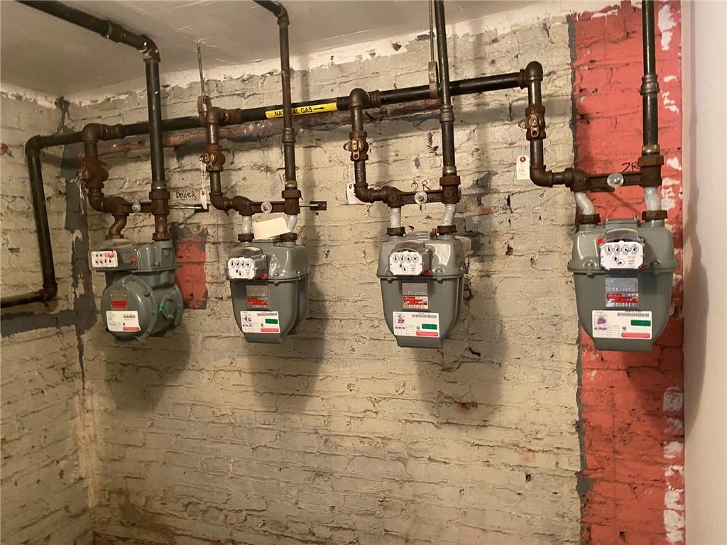 321 Milford Street Brooklyn, NY 11208 - Photo 21 of 31 a bathroom with a shower