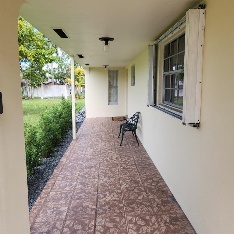 11249 Southwest 169th Street, Unit V4831 Miami, FL 33157 - Photo 3 of 18 Porch