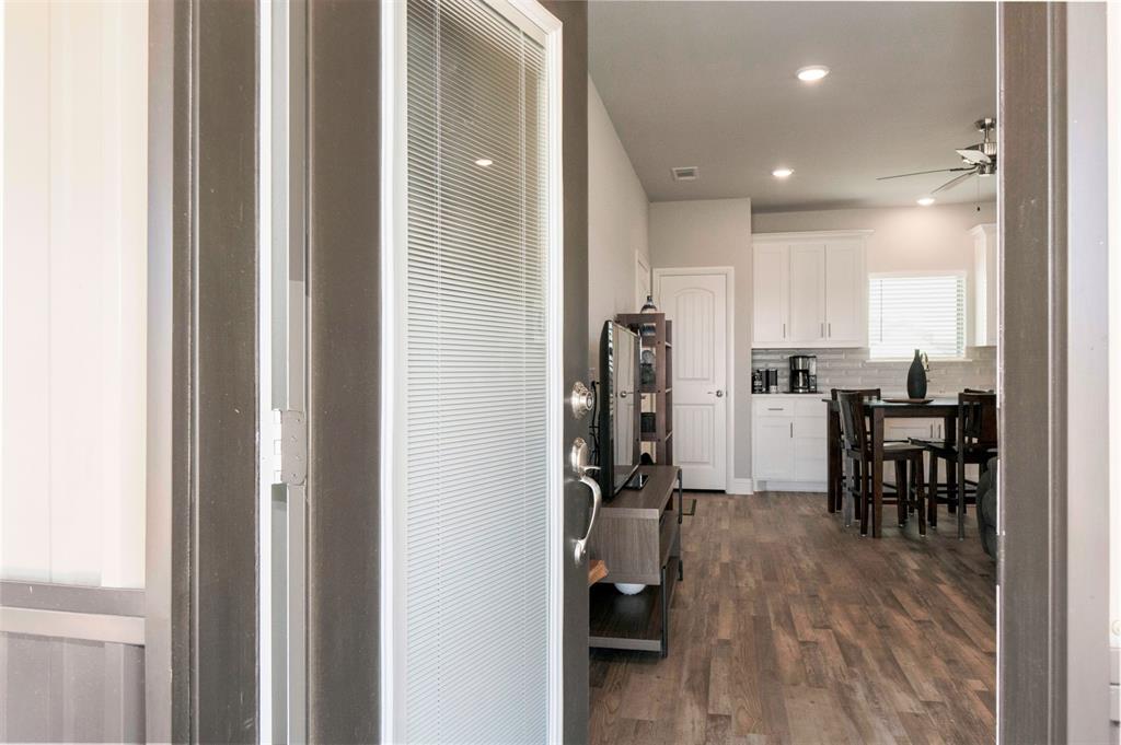 849 County Road 4764 Boyd, TX 76023 - Photo 29 of 40 a view of a kitchen from the hallway