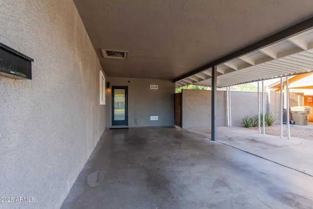 a outdoor living space with furniture and window