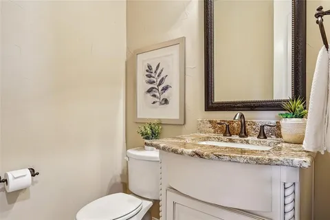 a view of house with backyard