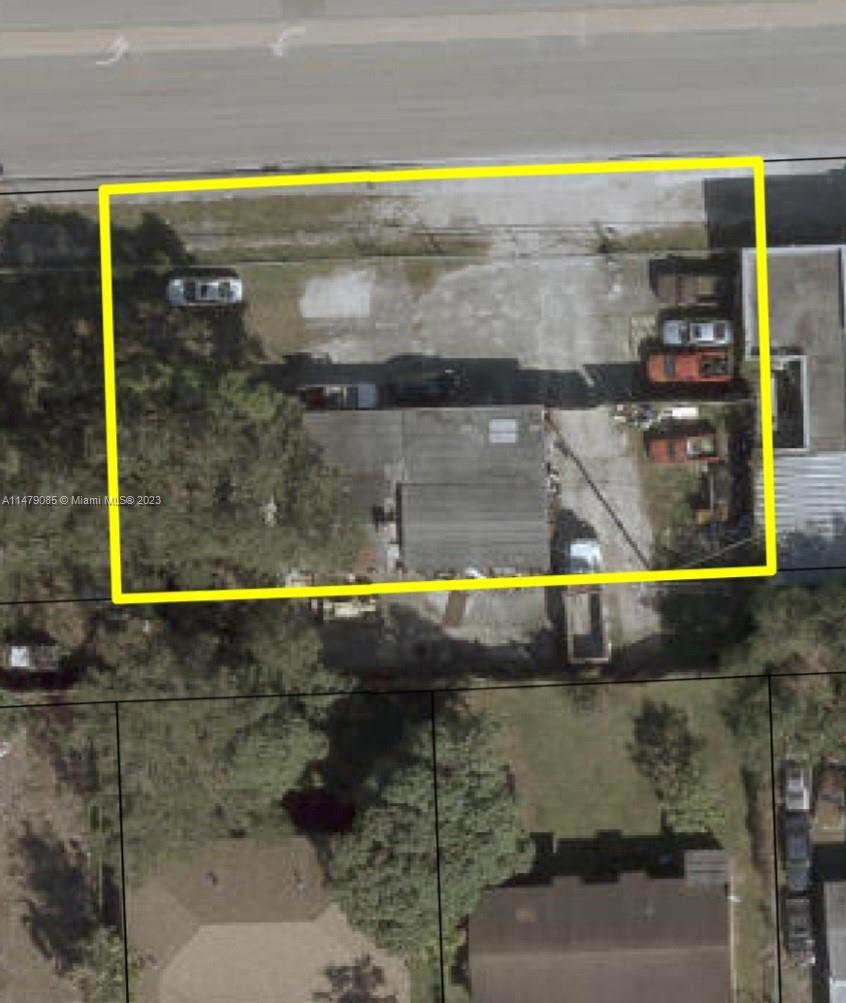 1878 Northwest 95th Street Miami, FL 33147 - Photo 2 of 4 a view of swimming pool with a yard