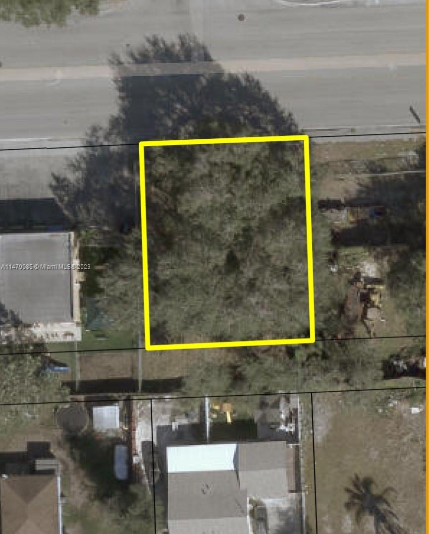 1878 Northwest 95th Street Miami, FL 33147 - Photo 4 of 4 a picture of a bathroom with a shower and a sink