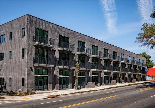 a view of a building with a street