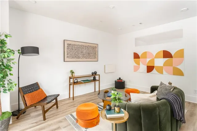 a living room with furniture and a table