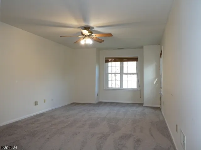 an empty room with a bathroom