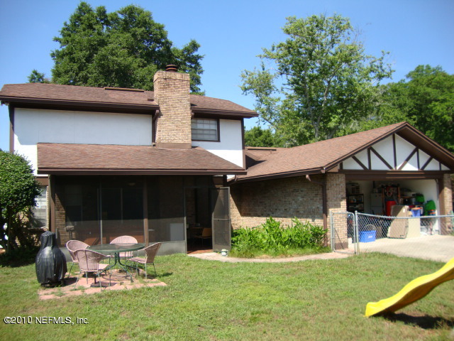 5911 Swamp Fox Road Jacksonville, FL 32210 - Photo 8 of 9 Rear Exterior
