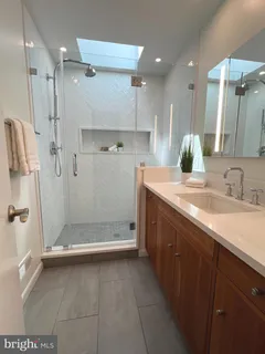 a bathroom with a sink and a toilet