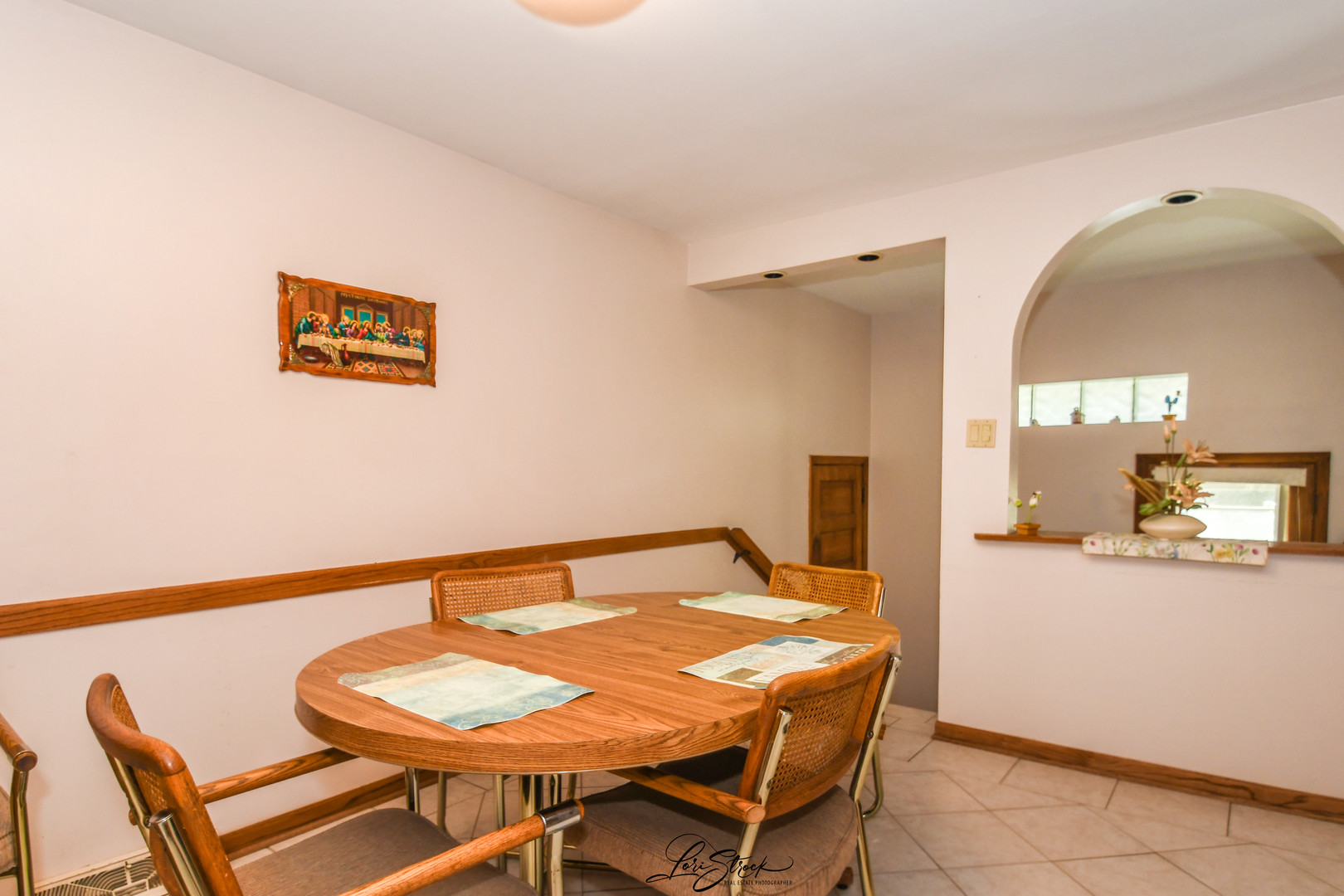 3409 173rd Place Lansing, IL 60438 - Photo 12 of 26 a dining room with a table and chairs