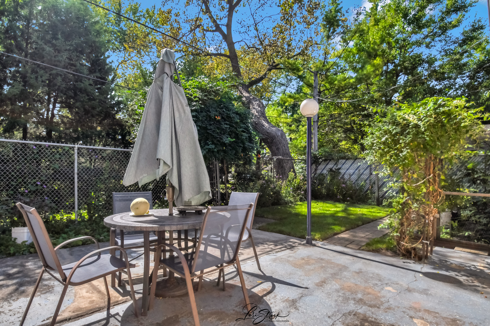 3409 173rd Place Lansing, IL 60438 - Photo 22 of 26 a view of a two chairs and table in the patio