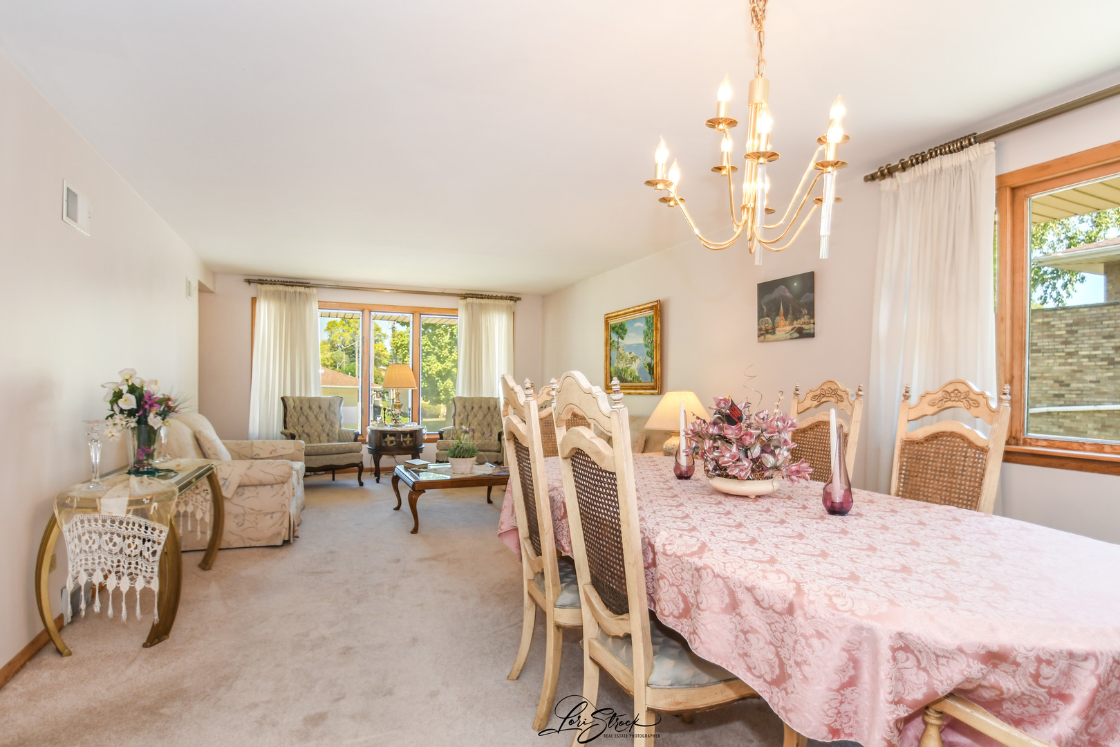 3409 173rd Place Lansing, IL 60438 - Photo 6 of 26 a large bedroom with furniture and a large window