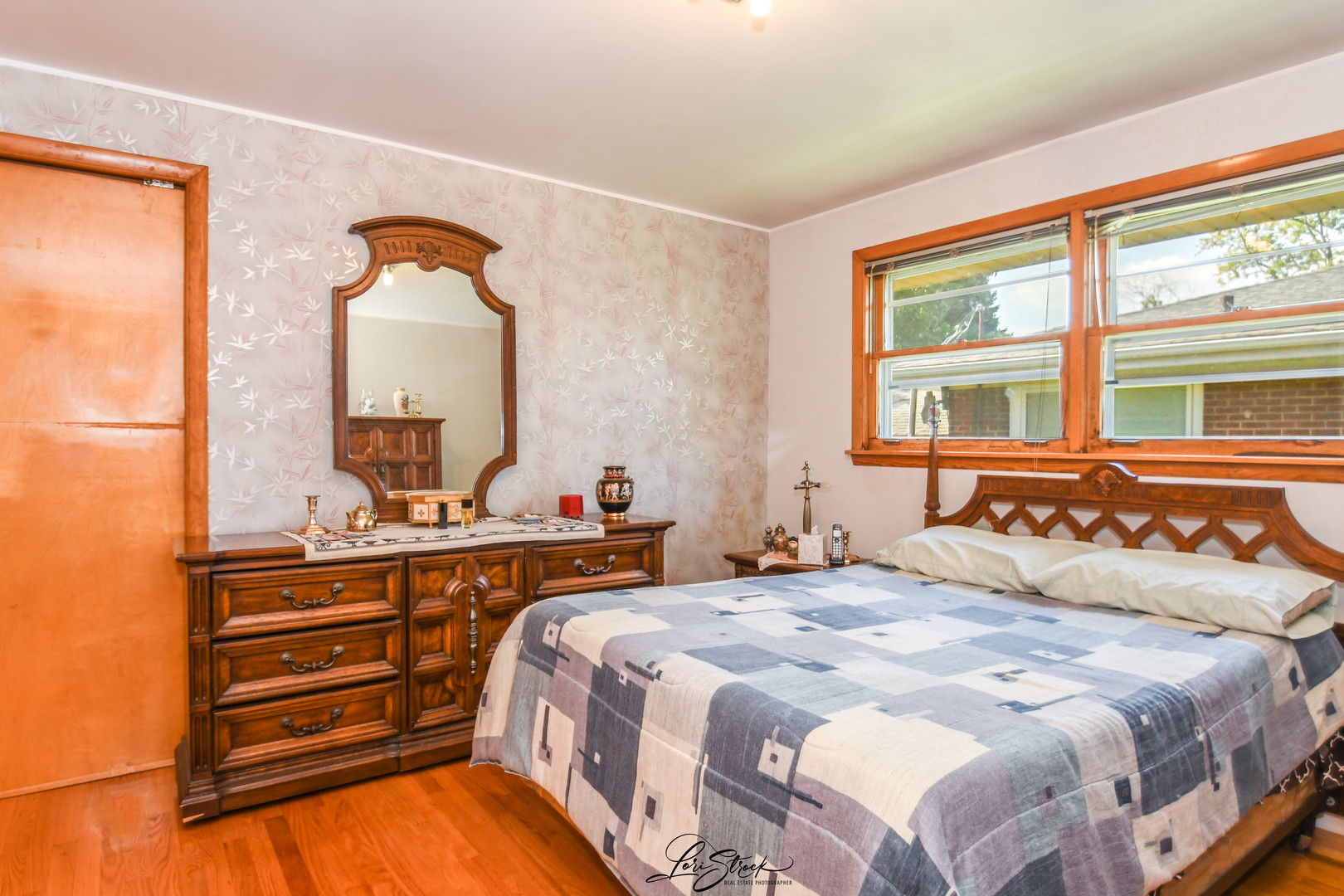 3409 173rd Place Lansing, IL 60438 - Photo 8 of 26 a bedroom with a bed and a dresser