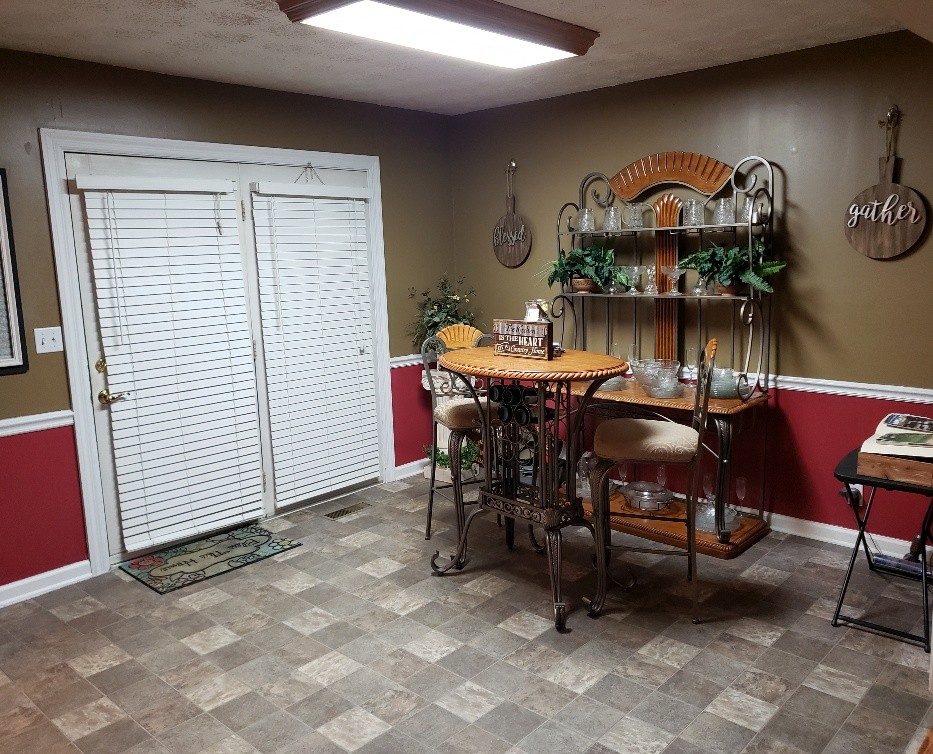 2154 Union Camp Road Lafayette, TN 37083 - Photo 13 of 23 a view of a dining room with furniture and a window
