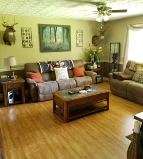 2154 Union Camp Road Lafayette, TN 37083 - Photo 14 of 23 a living room with furniture and a flat screen tv