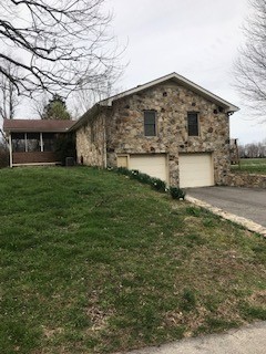 2154 Union Camp Road Lafayette, TN 37083 - Photo 2 of 23 a view of a house with a yard