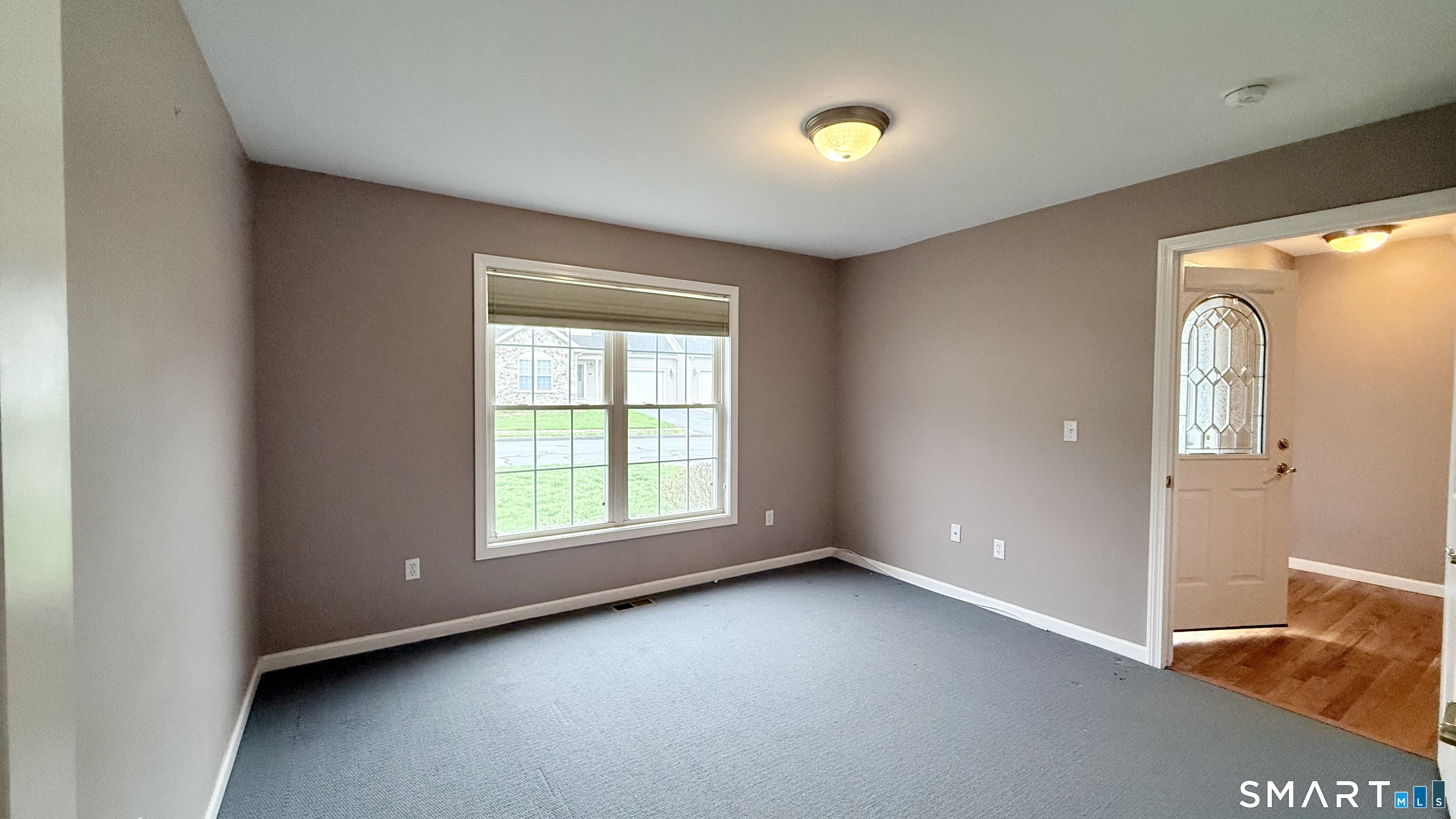 55 Nina's Way, Unit 55 Manchester, CT 06040 - Photo 14 of 25 an empty room with a window